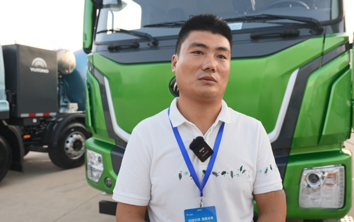 “清一色綠色軍團”，“鐵粉”為啥一次性訂購50臺宇通新能源重卡？